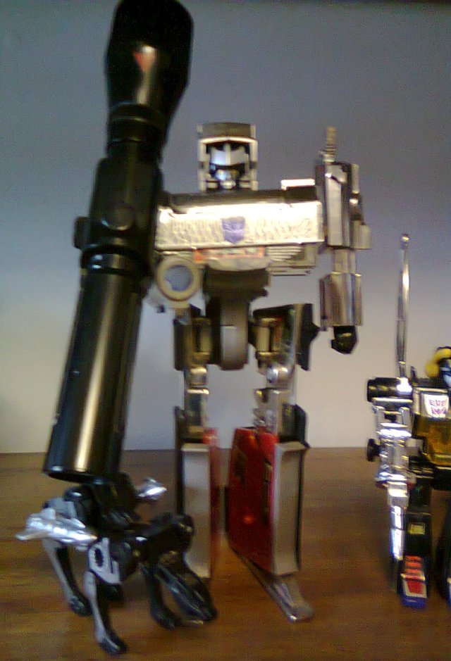 Ravage with his master G1 Megatron